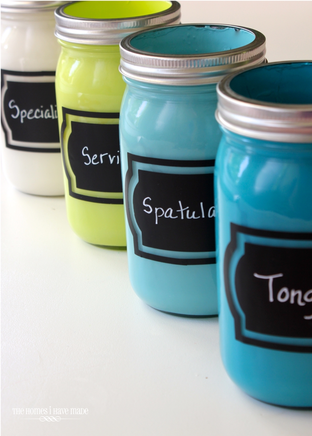 ForRent.com - Decrease Drawer Clutter with Painted Utensil Jars ForRent.com - Add metal rings back onto the jars.