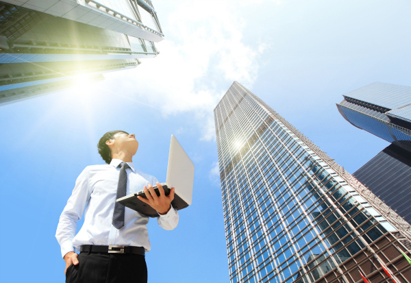 Businessman - ForRent.com Businessman looking at sky - ForRent.com