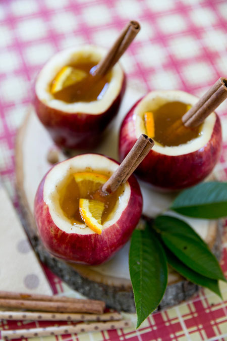 Apple-Cider-Cups-citrus slice ForRent.com Cozy up this fall with a cup of easy homemade citrus apple cider in an edible apple cup and cinnamon drink stirrer!