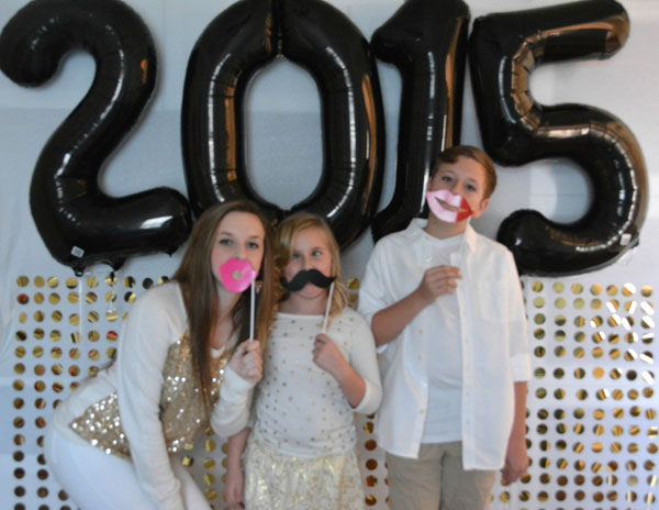 I love the gold and silver theme of my 2015 New Year's DIY Photo Booth DIY Sequin Photo Booth photo shoot