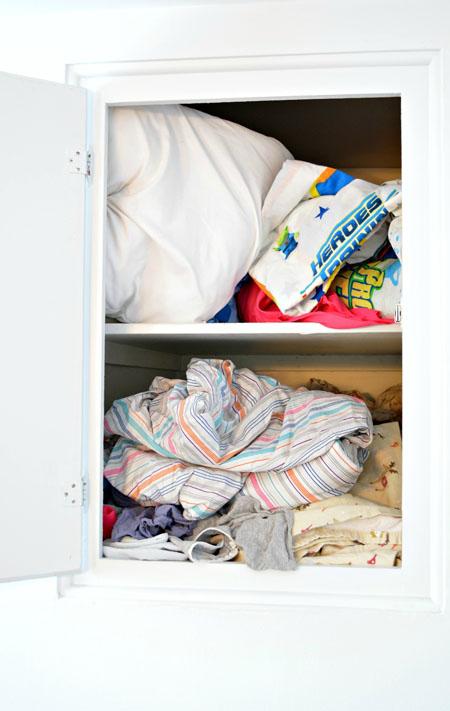 I am sharing a few handy tricks for keeping your linen closet tidy Fresh Linen Closet before