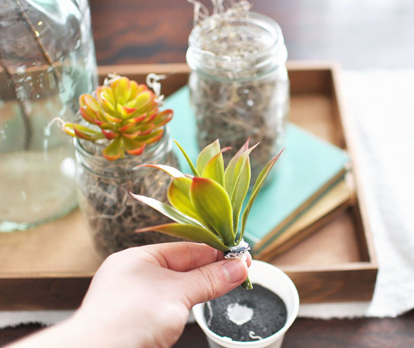 I used natural elements for this simple neutral table centerpiece. Neutral Natural Centerpiece Fake Succulents