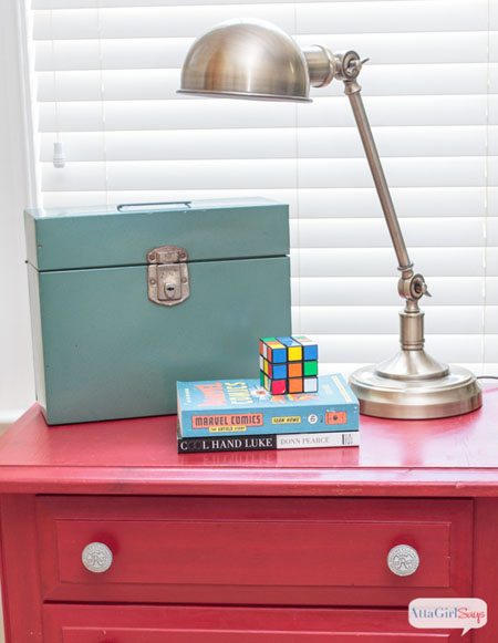 Some of my favorite double-duty decorating and storage solutions are metal boxes and tins Put It In a Box Nightstand
