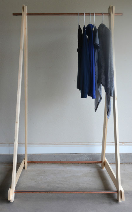 How To Easily Add Extra Clothing Storage In Your Apartment Diy Clothing Rack Wood Frame