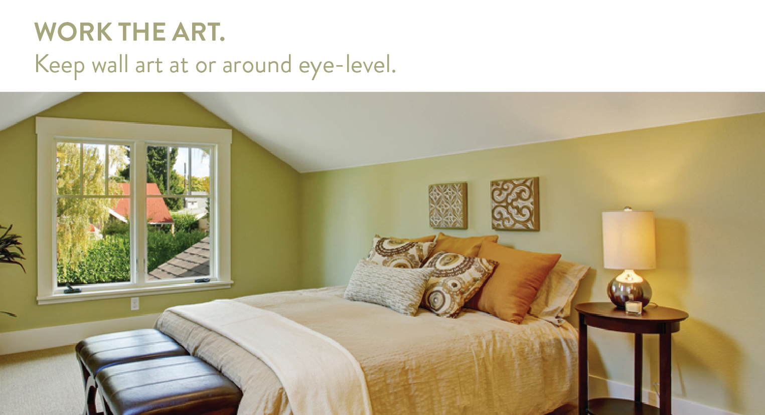 Use wall art for vaulted ceiling rooms