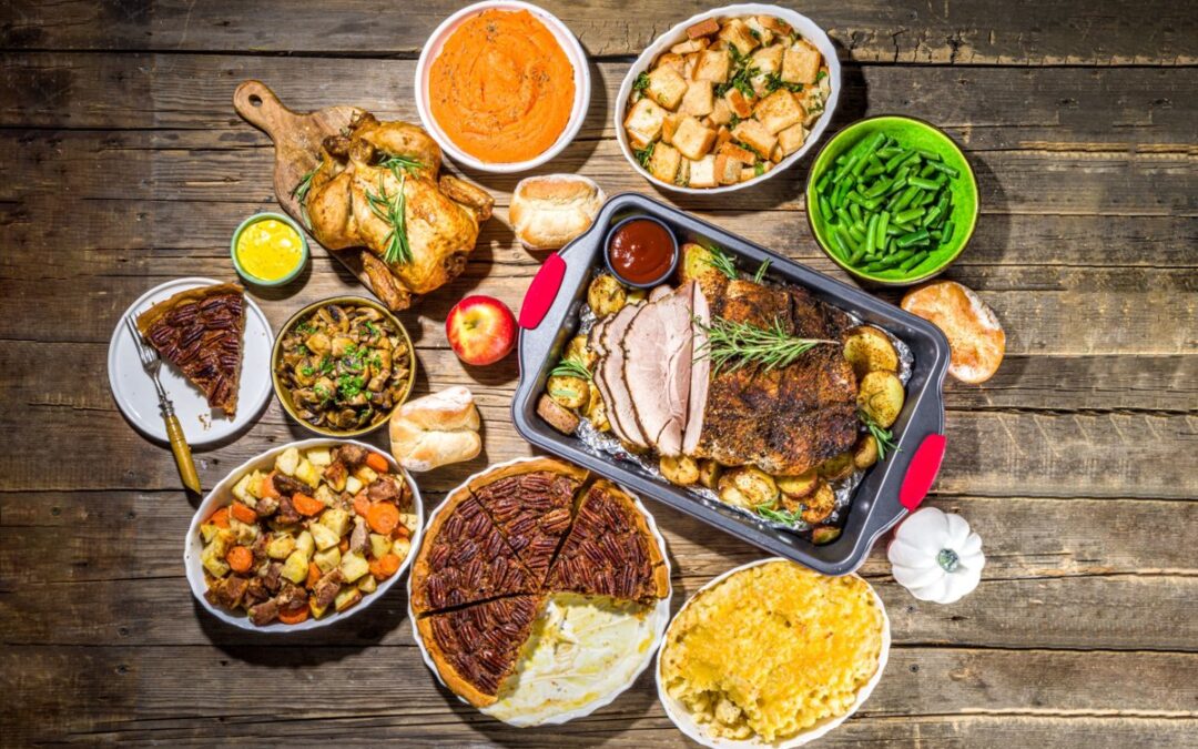 A table filled with traditional Thanksgiving food