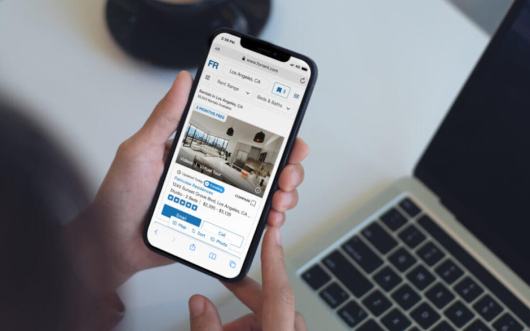 Phone displays apartment listings on ForRent.com