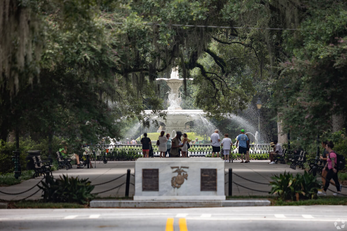 Visitors gather around the Forsyth Park fountain in Savannah, GA.