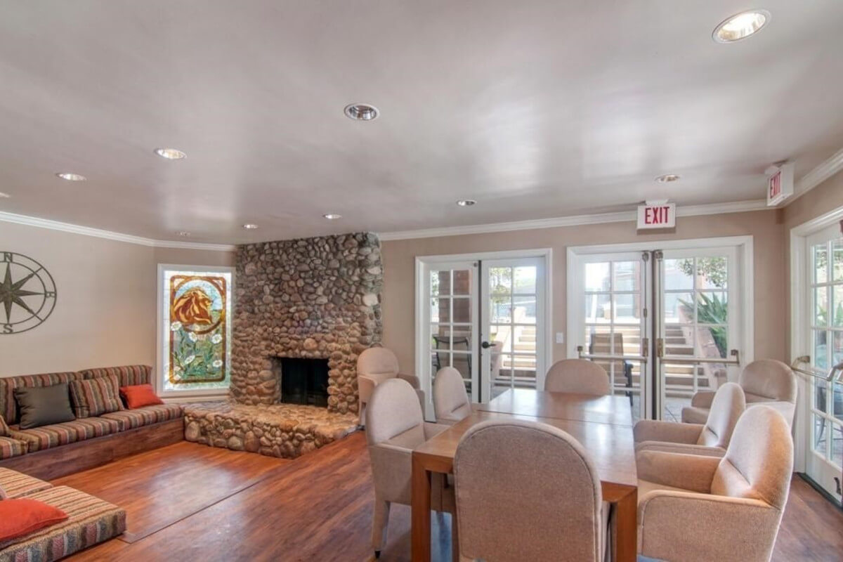 8870 Villa La Jolla Drive has a large stone fireplace.