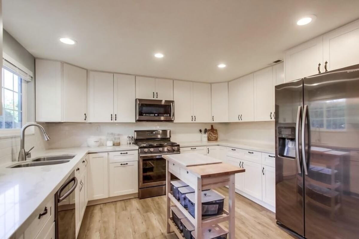 9929 Maya Linda Road is a townhome in Miramar with stainless steel appliances and white cabinets.