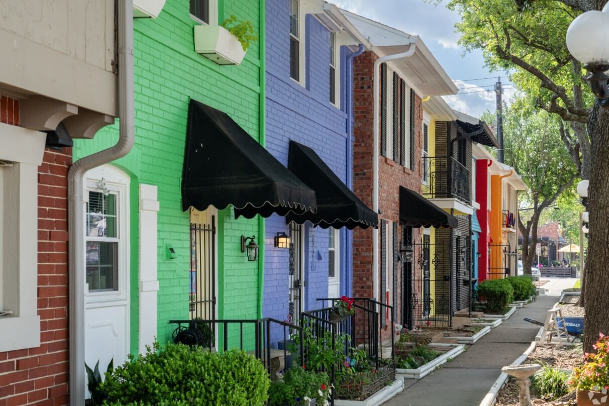 Bright, colorful townhomes along a side street