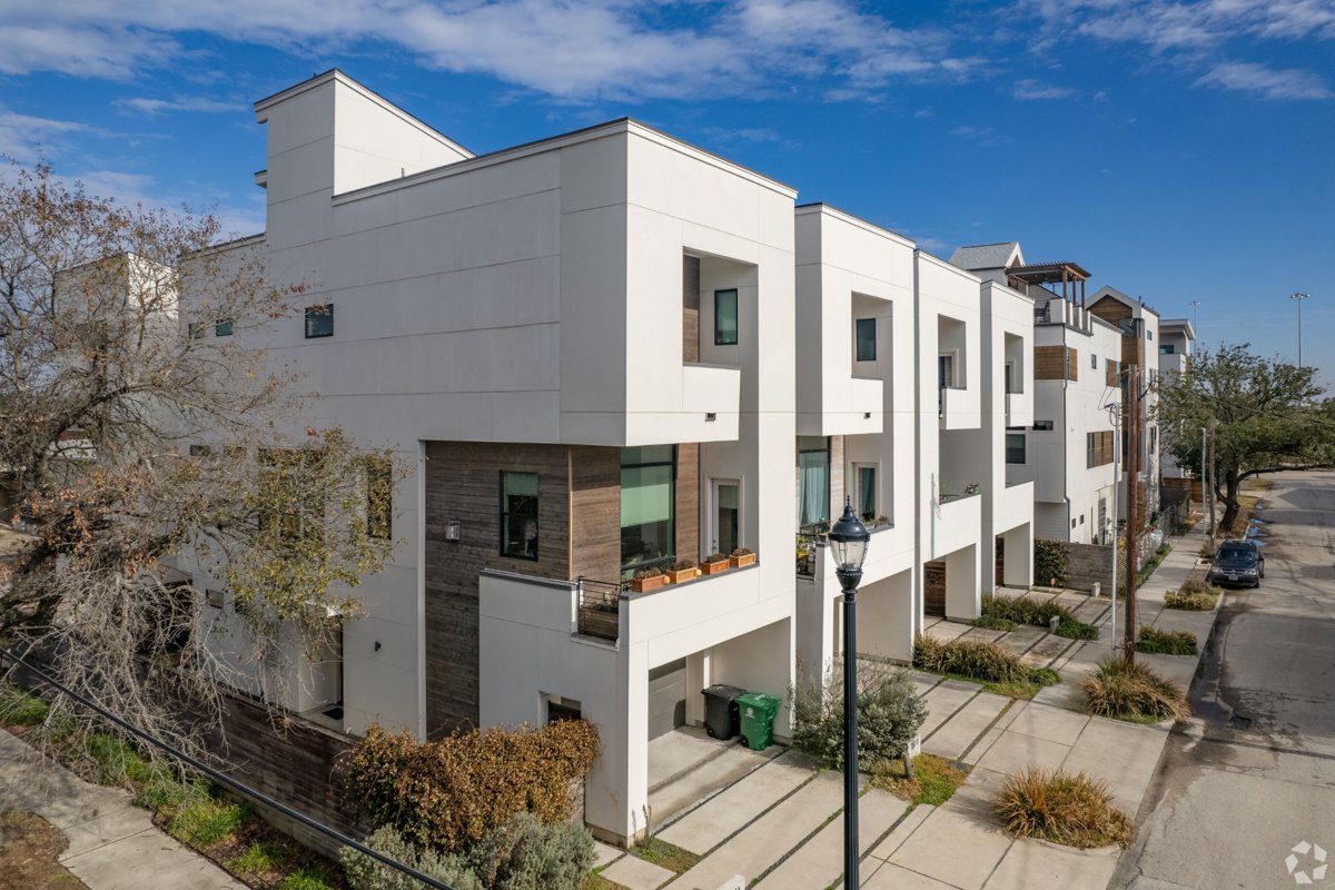 Modern townhomes along a suburban street